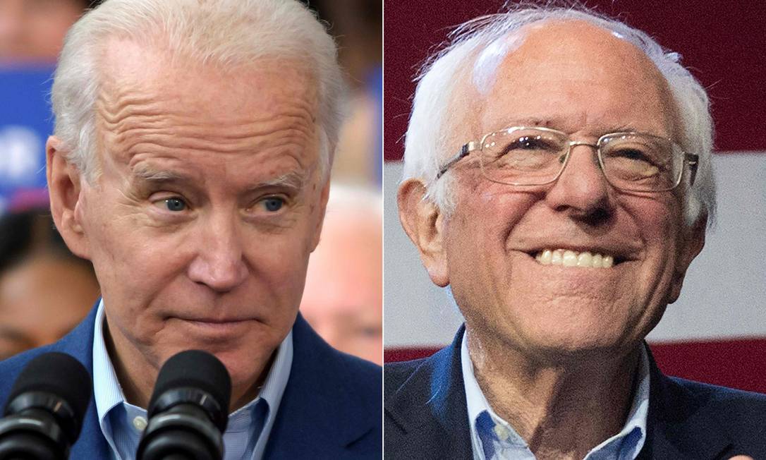 Joe Biden (E) e Bernie Sanders (D) se enfrentam em 6 primárias nesta terça-feira, uma noite que pode definir o nome do Partido Democrata na eleição presidencial de novembro Foto: AFP