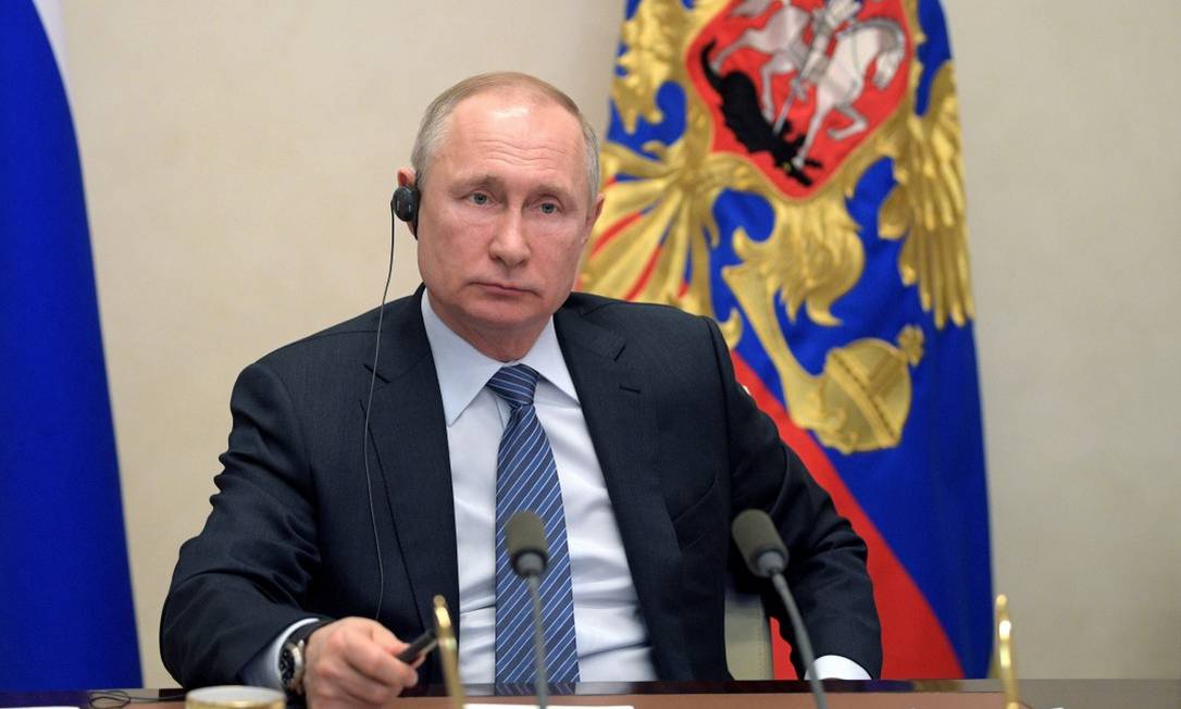 Vladimir Putin, durante vídeoconferência entre líderes do G20 Foto: SPUTNIK / via REUTERS
