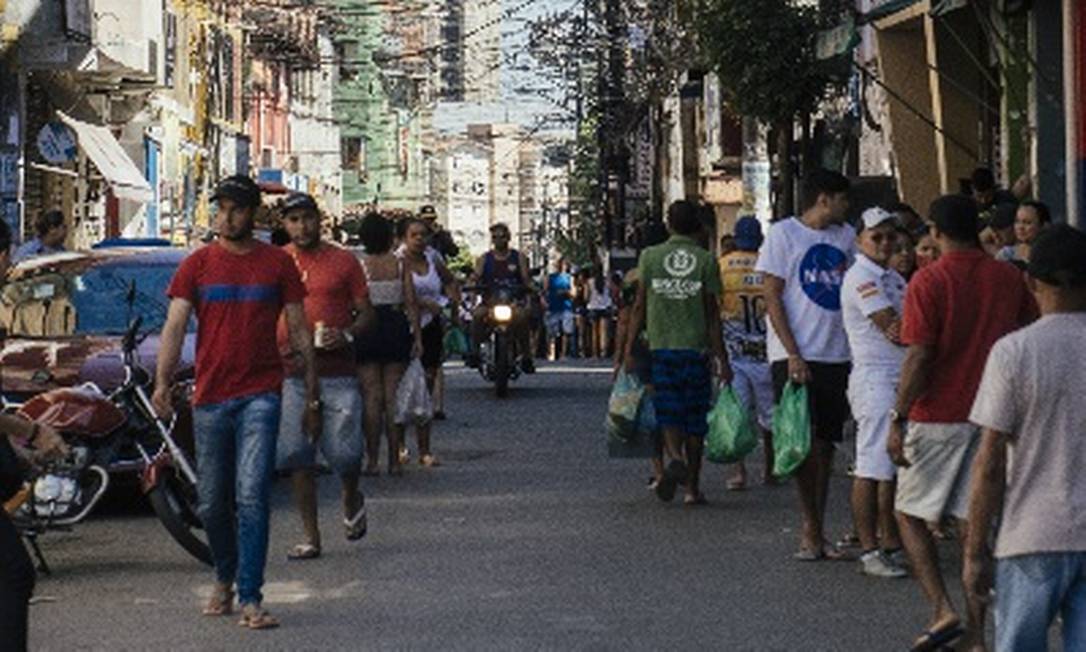 Ruas movimentadas da comunidade de Paraisópolis, em SP Foto: Agência O Globo