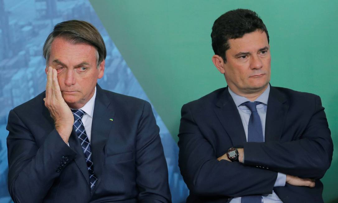 Bolsonaro e Moro durante cerimônia no Palácio do Planalto, em Brasília Foto: Adriano Machado / Reuters