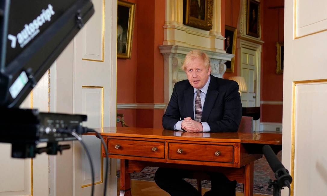 Primeiro-ministro do Reino Unido, Boris Johnson, durante anúncio de medidas para iniciar retomada das atividades no país Foto: ANDREW PARSONS / AFP