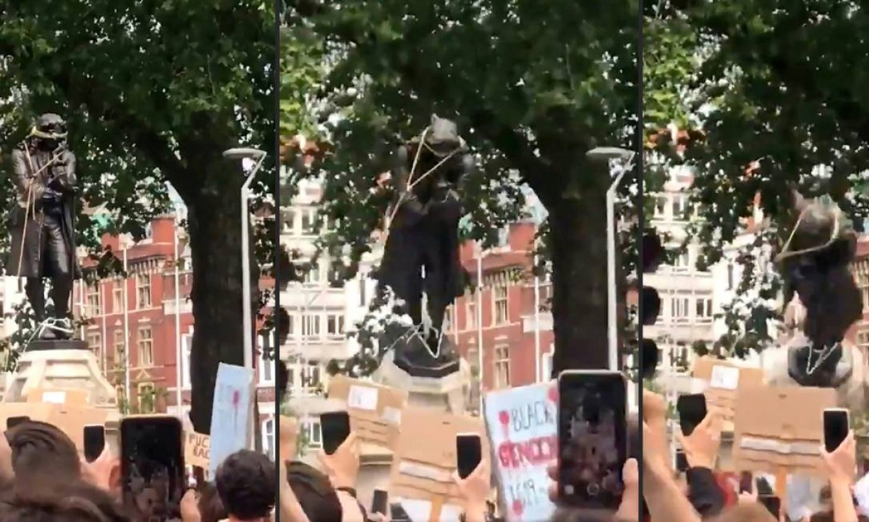 Debate sobre as estátuas que homenageiam escravocratas ganhou força depois que manifestantes de Bristol, no sudoeste da Inglaterra, derrubaram, no domingo, a estátua de Edward Colston, um traficante de escravos do século 17 Foto: - / AFP
