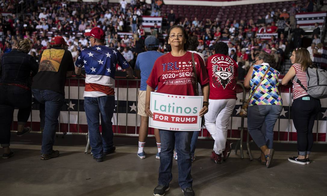 Membros do grupo Latinos for Trump participam de um comício do presidente republicano Foto: ADRIA MALCOLM / NYT/16-09-2019