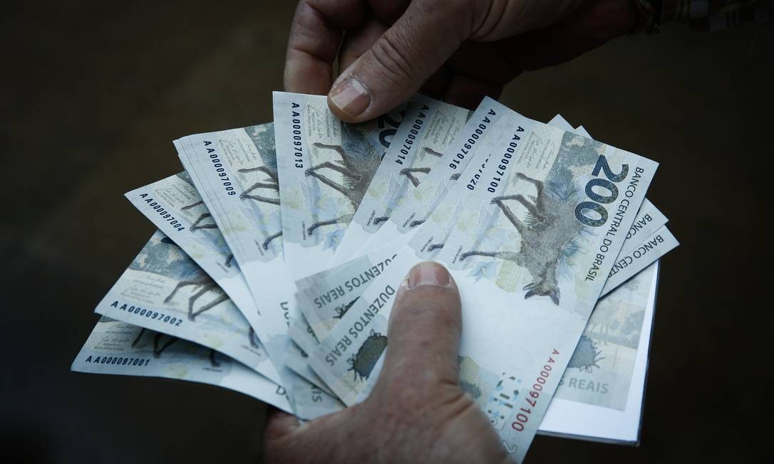 Tiragem da cédula é de 450 milhões de unidades, equivalentes a R$ 90 bilhões Foto: Pablo Jacob / Agência O Globo