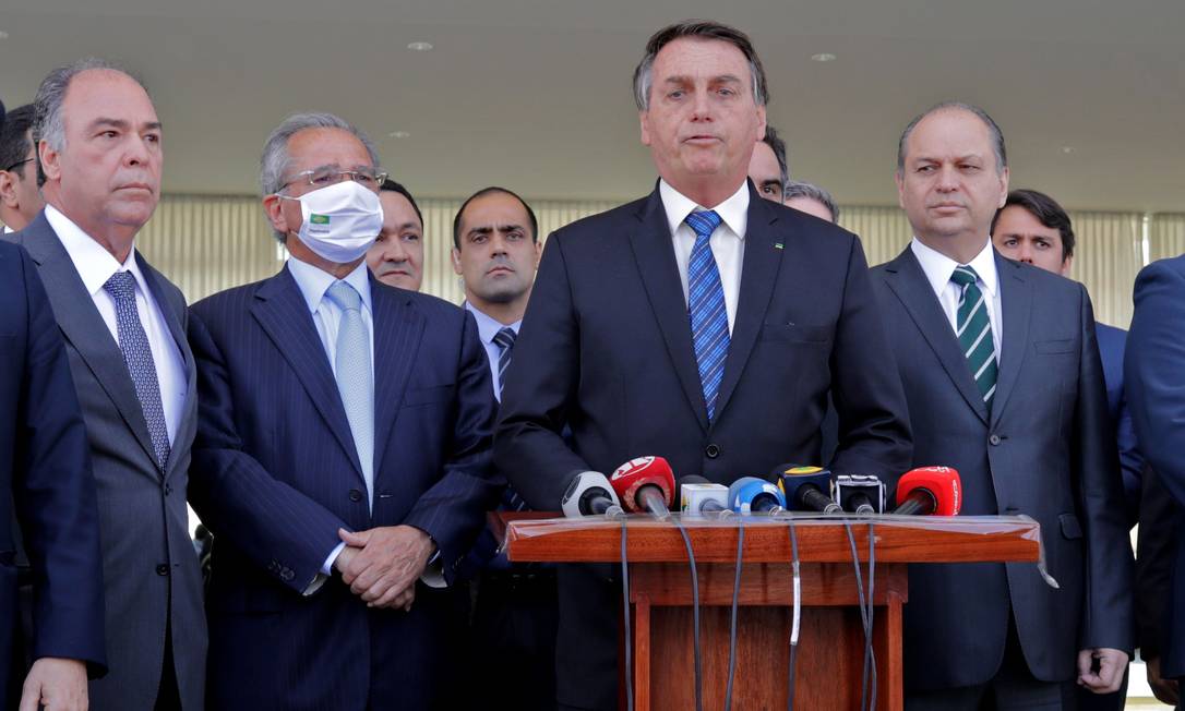 O presidente Jair Bolsonaro, ao lado do ministro da Economia, Paulo Guedes Foto: Sérgio Lima / AFP