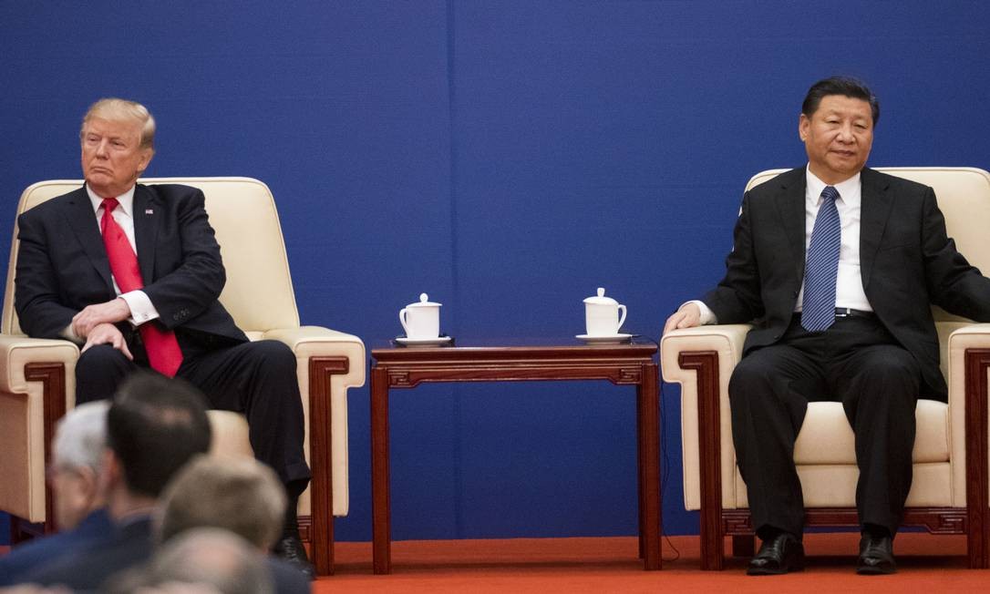 Os presidentes americanos Donald Trump e China Xi Jinping em reunião de cúpula em Pequim em 2017. Crescente rivalidade entre os países Foto: DOUG MILLS / NYT - 11/09/2017