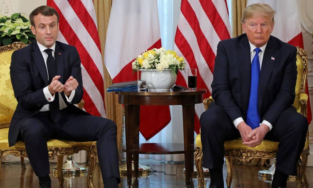 Trump e o presidente da França, Emmanuel Macron, se encontram em reunião paralela à cúpula da Otan, em Londres: o francês criticou a Turquia, defendida pelo americano Foto: POOL / Reuters 03/12/2019
