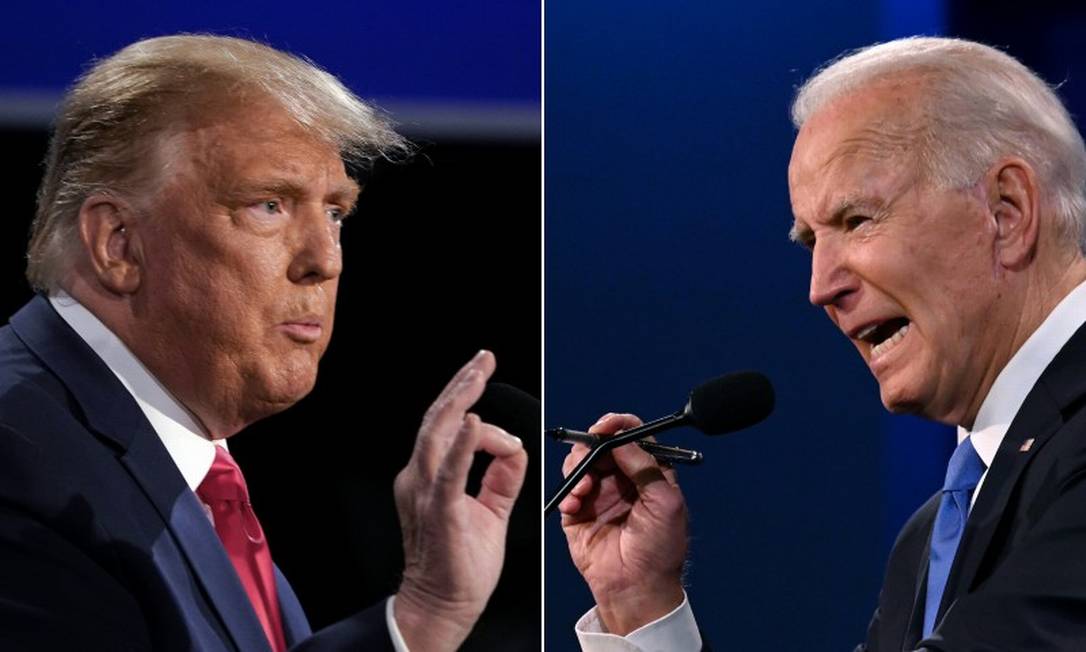 Donald Trump e Joe Biden, durante debate presidencial em Nashville Foto: AFP / 22-10-2020