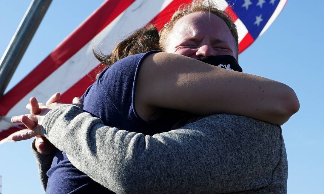 Biden supporters celebrate near the place where the president-elect plans to deliver his victory speech in Wilmington, Delaware Photo: KEVIN LAMARQUE / REUTERS