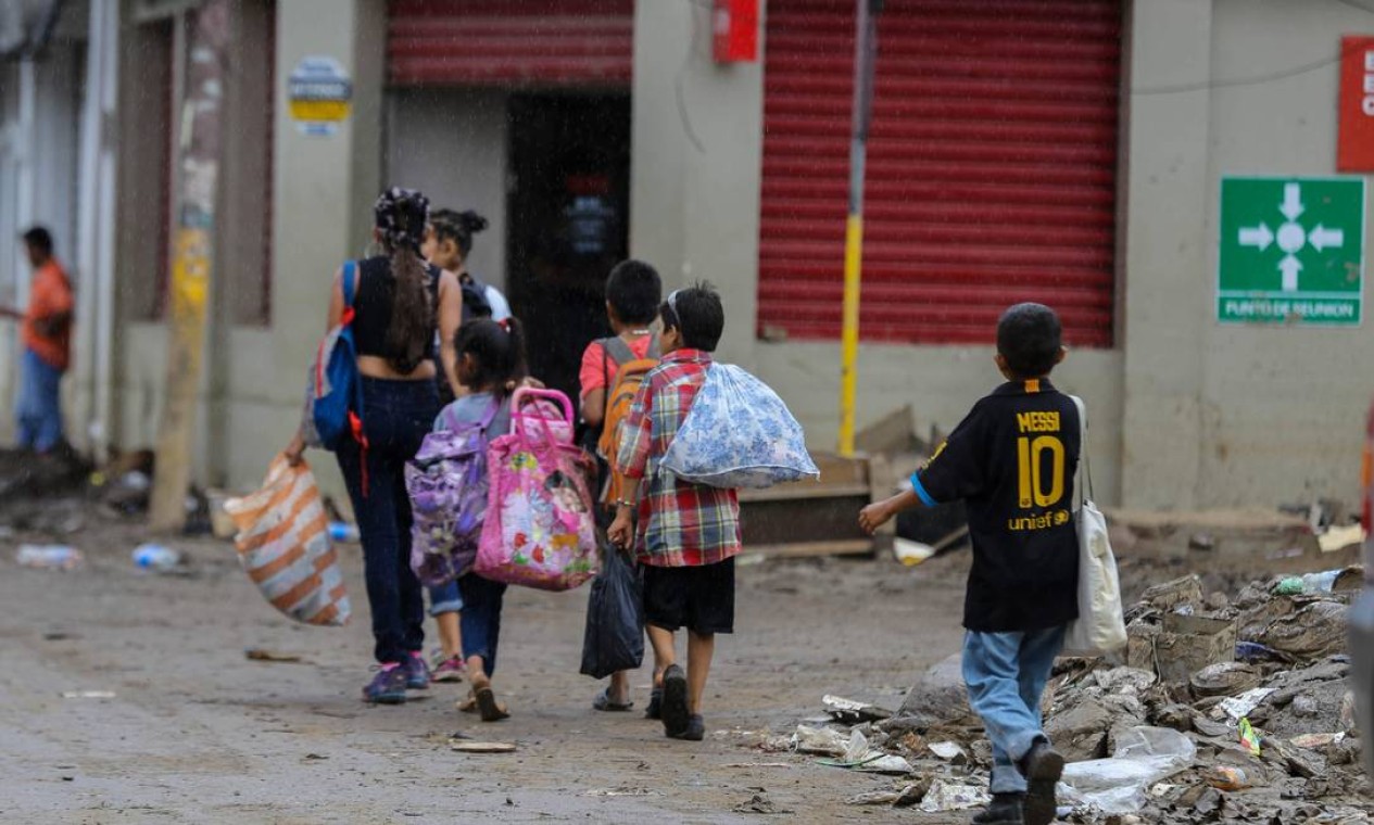 Moradores deixam suas casas em La Lima, Cortes, Honduras Cortes, Honduras Foto: WENDELL ESCOTO / AFP