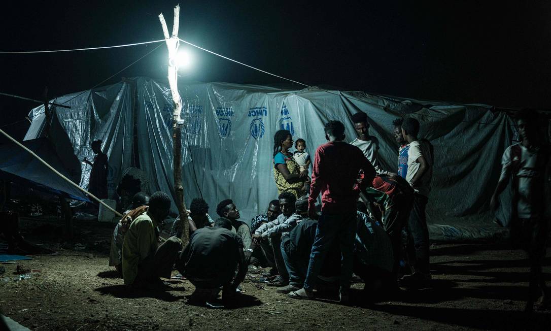 Etiopes que fugiram da região de Tigré em um campo de refugiados no Sudão Foto: Yasuyoshi Chiba / AFP