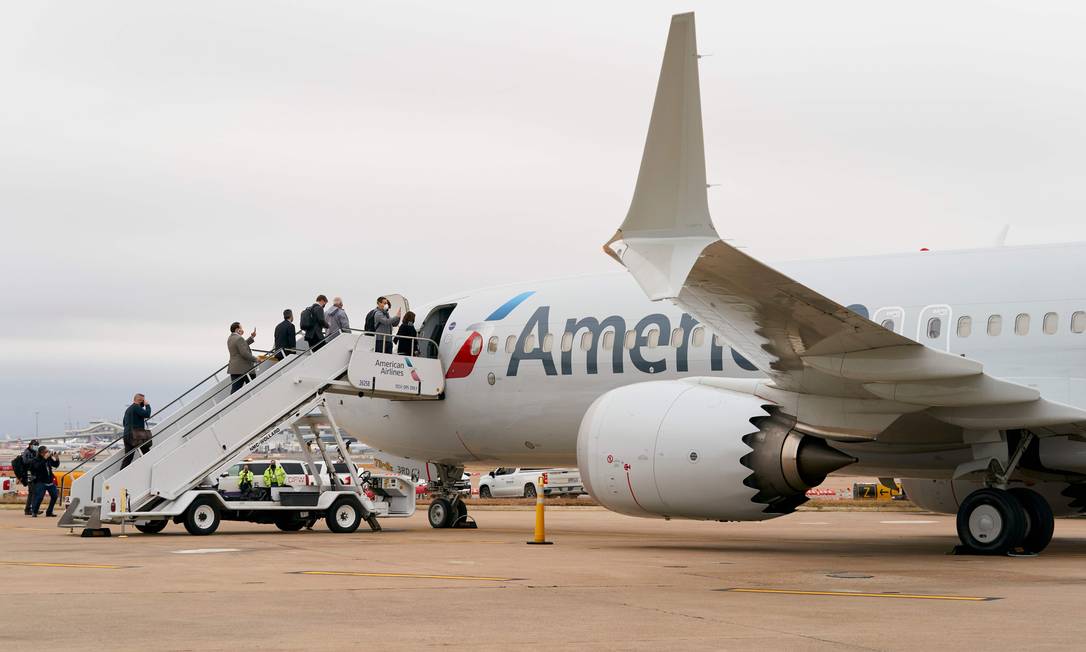 Embarque no Aeroporto Internacional de Dallas, no TExas, em 2 de dezembro de 2020 Foto: Cooper Neill / AFP