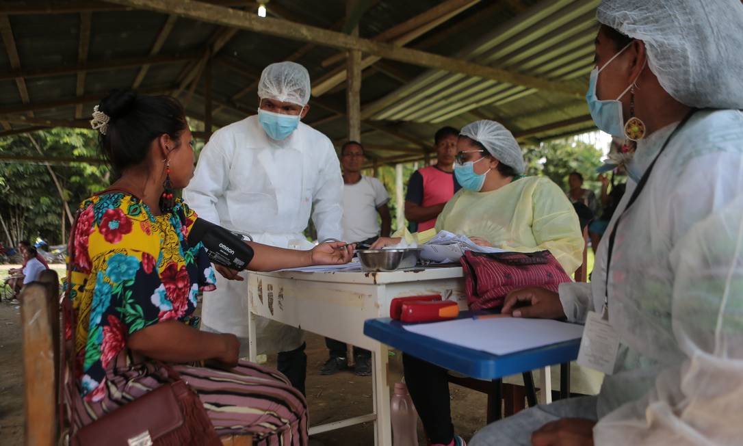 Missão Alto Solimões leva 27 profissionais de saúde para aldeias indígenas, como Campo Alegre, próximo a Tabatinga (AM) Foto: Jorge William / Agência O Globo
