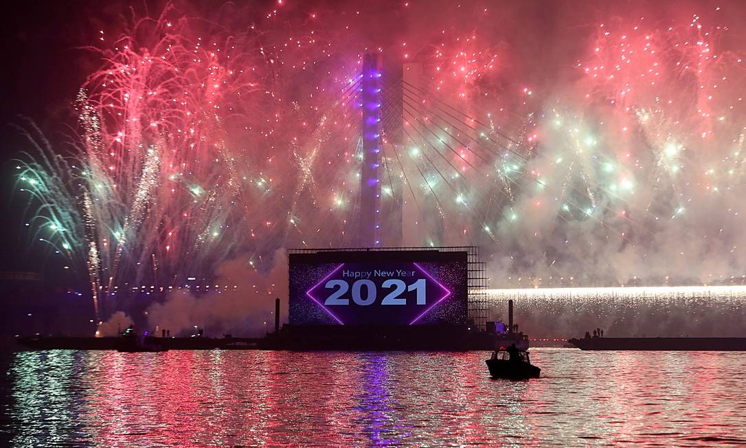 Fireworks explode over the new suspension bridge that crosses the Nile River and names the Tahya Misr (Long Live Egypt) Bridge, during New Year celebrations amid the COVID-19 outbreak in Cairo, Egypt Photo: MOHAMED ABD THE GHANY / REUTERS