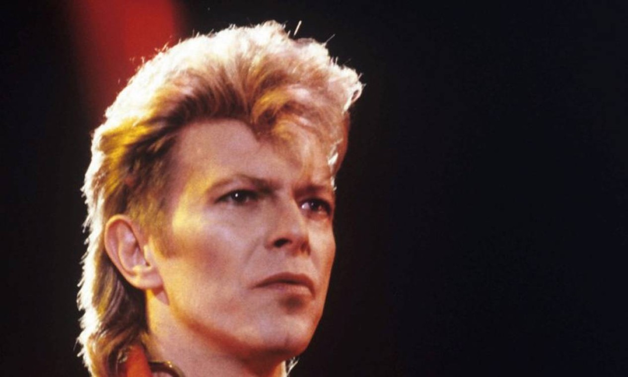 PASSADO: David Bowie,inspiração de mullet para uma geração inteira Foto: HARALD MENK / AFP