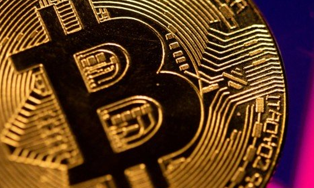 Bitcoin: criptomoeda pode ser declarada no IR Foto: Arquivo