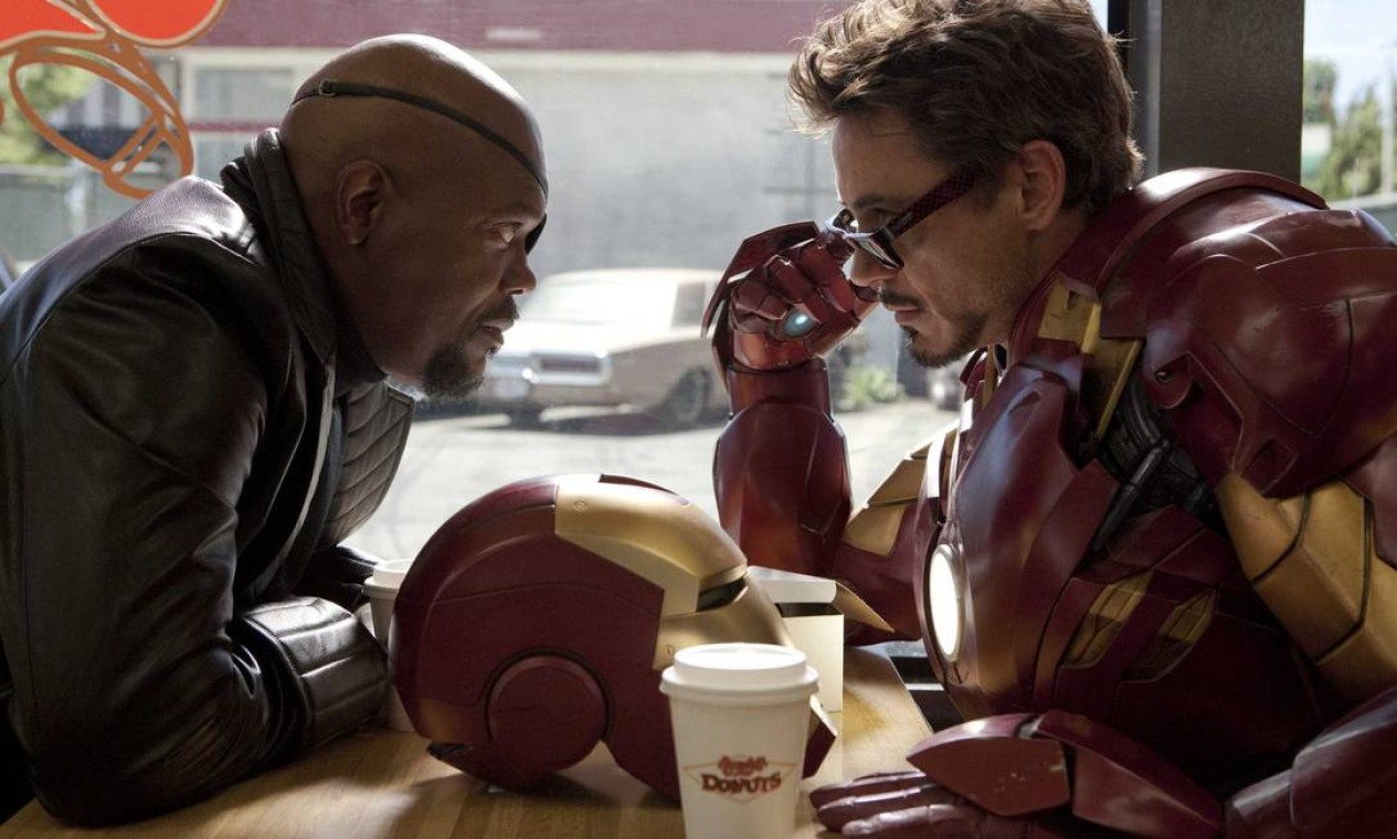 'Homem de Ferro 2' (2010): Com o mundo agora ciente de sua identidade como Homem de Ferro, Tony Stark deve lidar com o declínio de sua saúde e um homem louco vingativo ligado ao legado de seu pai. Foto: Reprodução