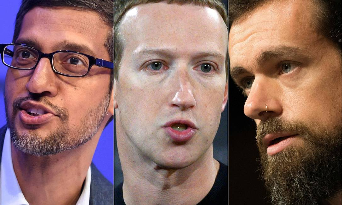 Sundar Pichai, CEO da Alphabet; Mark Zuckerberg, do Facebook; e Jack Dorsey, do Twitter depuseram em sessão do Congresso americano sobre o papel das redes sociais na invasão do Capitólio Foto: AFP
