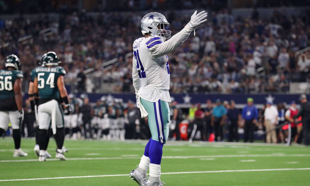 1º - Dallas Cowboys (NFL): 5,7 bilhões de dólares Foto: TOM PENNINGTON / AFP