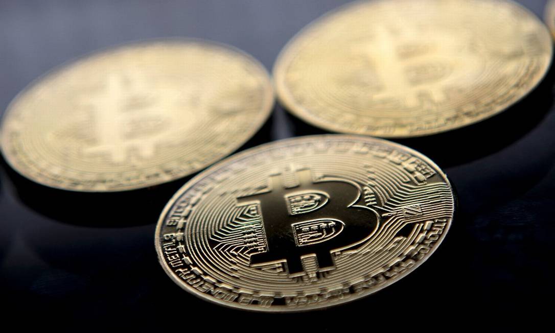 Bitcoin: tombo vertiginoso nos mercados Foto: JUSTIN TALLIS / AFP