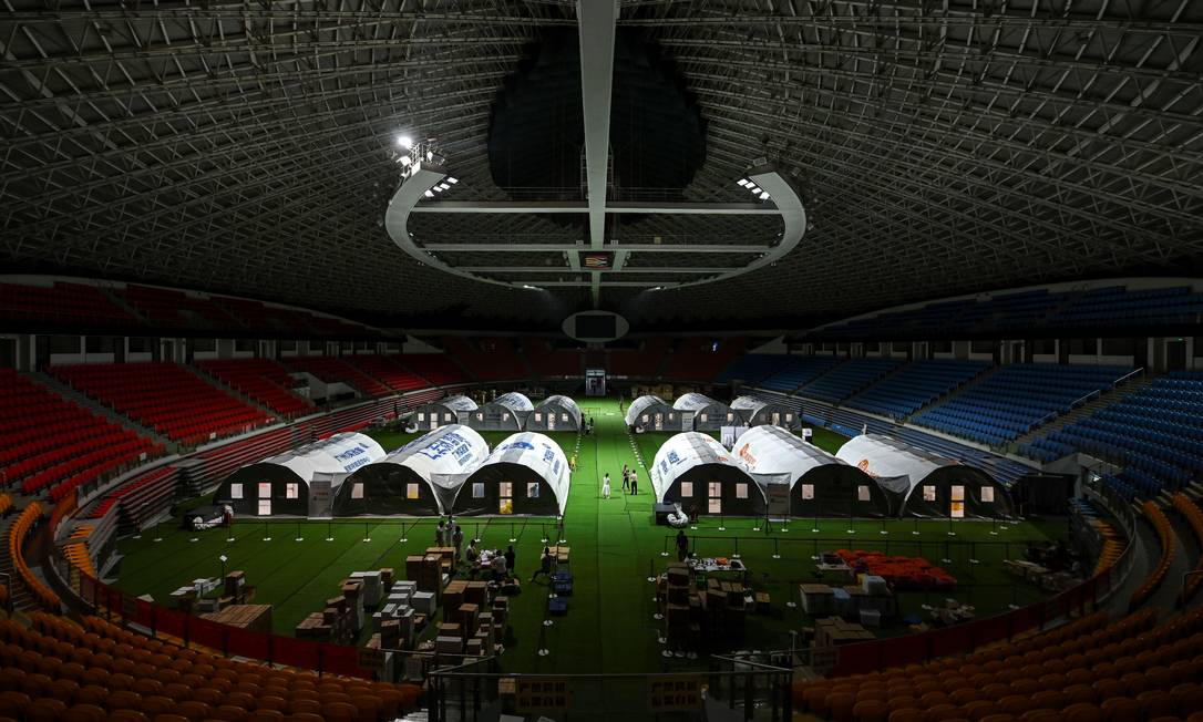 Centros móveis de testagem são vistos no ginásio municipal de Guangzhou, província de Guangdong, China Foto: STRINGER / VIA REUTERS/03-06-2021