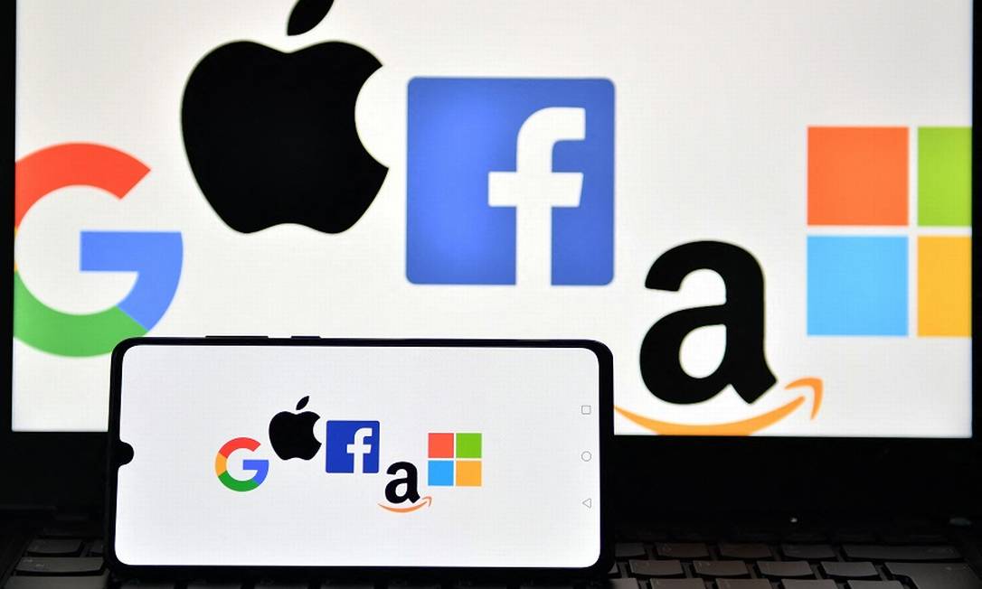 Logotipos de Google, Apple, Facebook, Amazon e Microsoft: grandes companhias de tecnologia estão na mira do Congresso dos EUA Foto: JUSTIN TALLIS / AFP