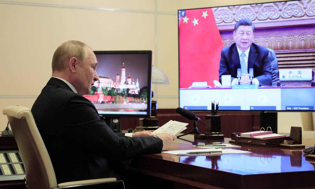 Presidente russo, Vladimir Putin, assiste participação do presidente chinês, Xi Jinping, na cúpula do G20 de Moscou, na Rússia Foto: SPUTNIK / via REUTERS