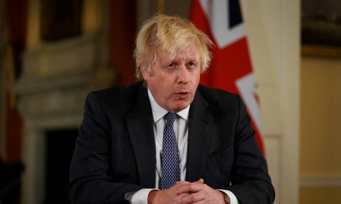 O primeiro-ministro britânico Boris Johnson em pronunciamento Foto: Kirsty O'Connor / via Reuters