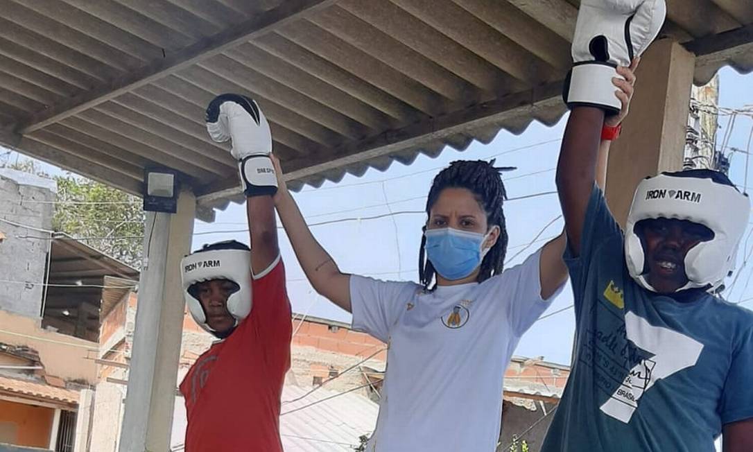 Crianças aprendem boxe no Morro do Cavalão Foto: Divulgação