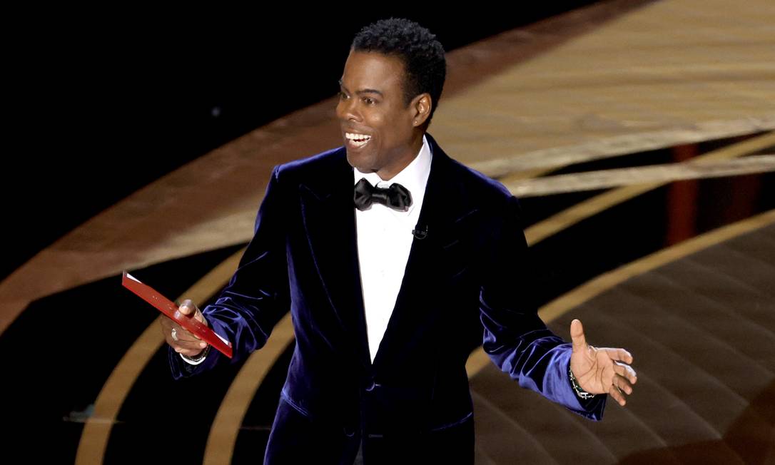 'Esse é o maior momento da história da televisão', disse Chris Rock após levar tapa de Will Smith durante a cerimônia do Oscar. Foto: Neilson Barnard / AFP