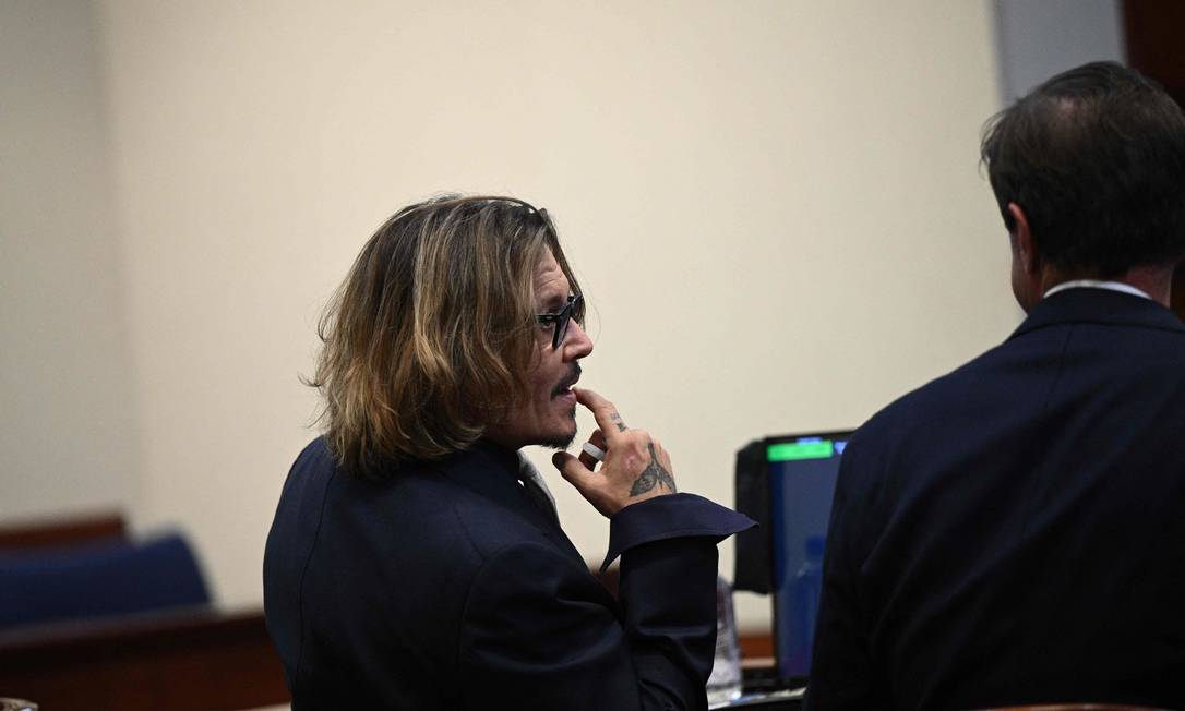 Ator Johnny Depp no tribunal Foto: BRENDAN SMIALOWSKI / AFP