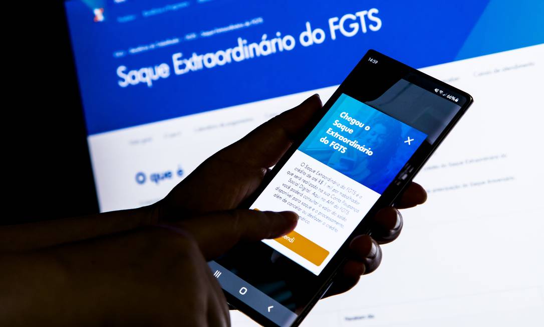 Caixa Economica apresentou novos site e aplicativo para celular para o saque extraordinario do FGTS Foto: Leo Martins / Agência O Globo