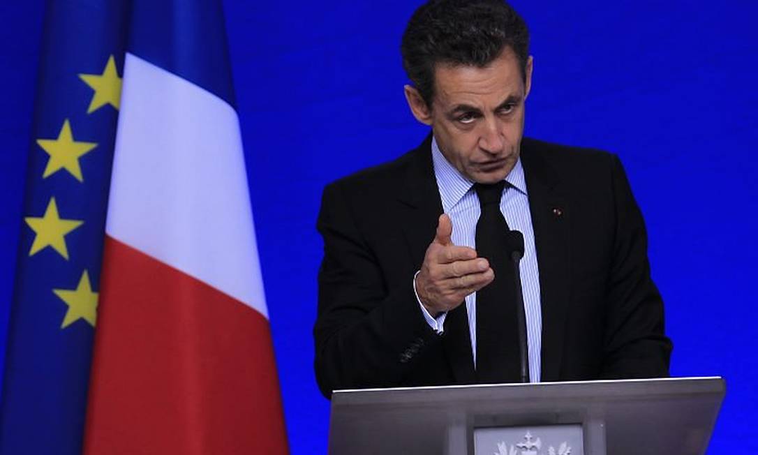 O presidente da França em entrevista coletiva após o fechamento do acordo para reduzir a dívida grega Foto: Reuters