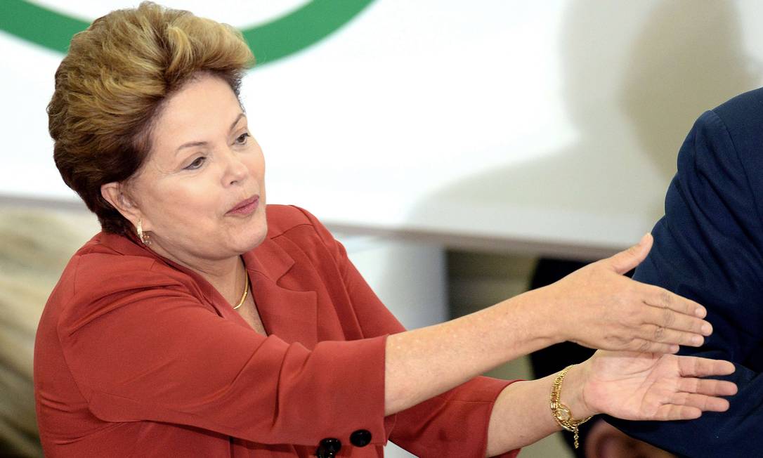  Dilma Rousseff durante cerimônia sobre o programa 'Mais Médicos' Foto: EVARISTO SA / AFP