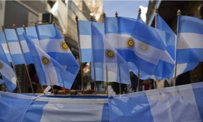 
Bandeiras da Argentina nas ruas de Buenos Aires Foto: Bloomberg