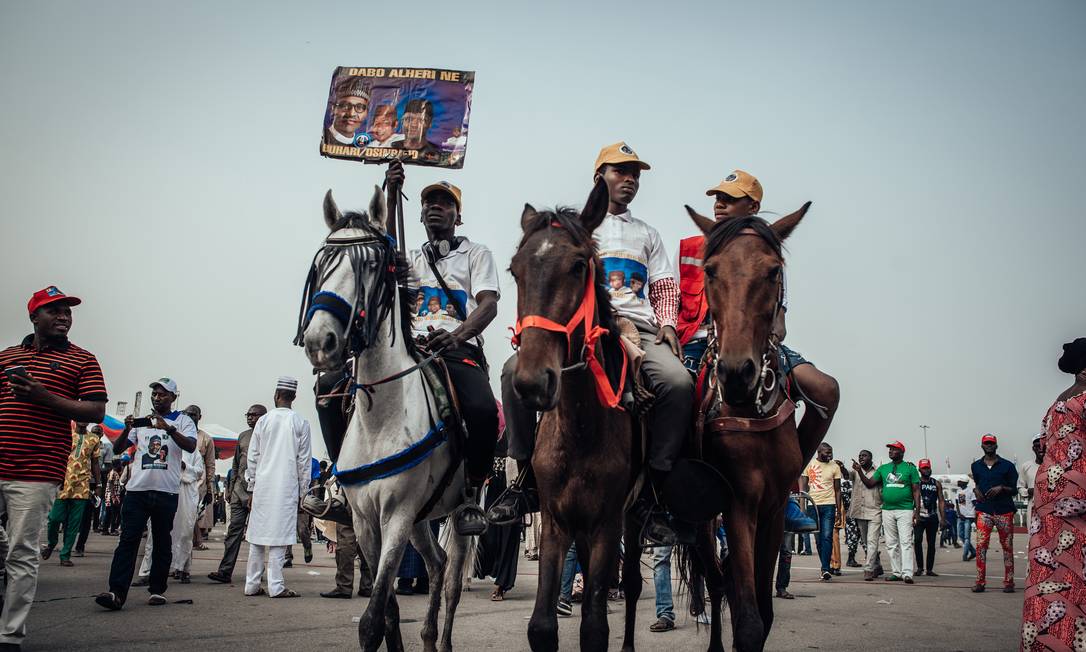 Apoiadores do presidente Muhammadu Buhari durante a campanha eleitoral na Nigéria Foto: NWAKALOR KENECHUKWU / NYT/13-2-2019