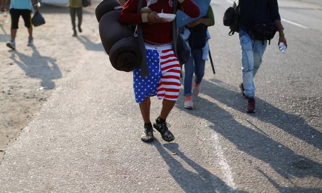 Central American migrants walk during their journey towards the United States, in Mapastepec, Mexico April 20, 2019. REUTERS/Jose Cabezas Foto: JOSE CABEZAS / REUTERS