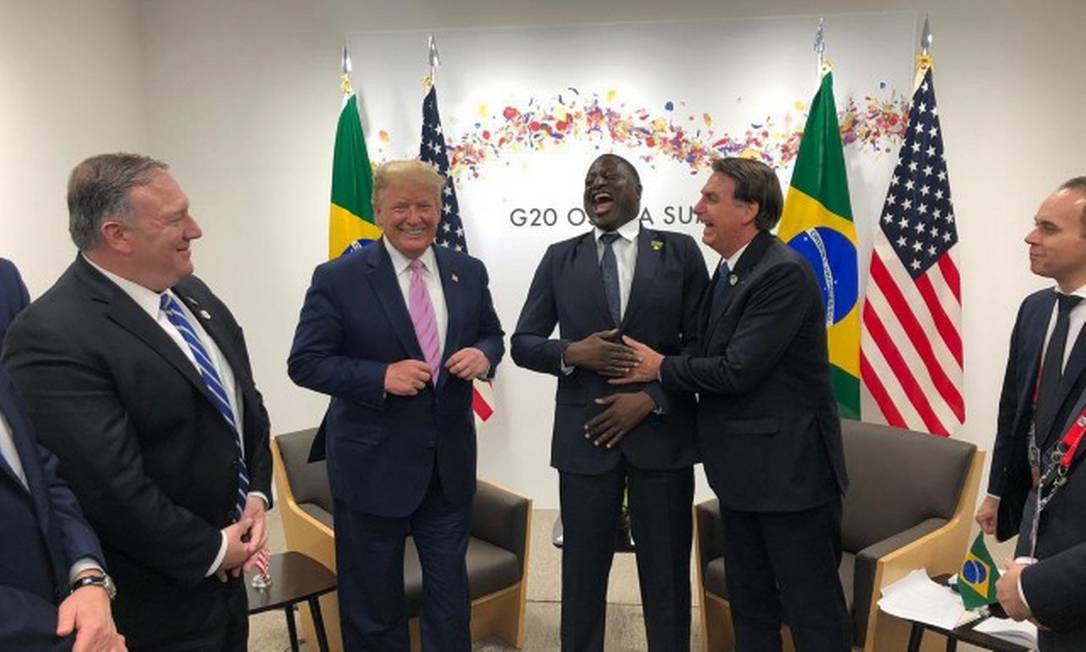 O presidente americano Donald Trump ao lado do deputado federal Helio Lopes e do presidente Jair Bolsonaro Foto: Reprodução / Presidência da República