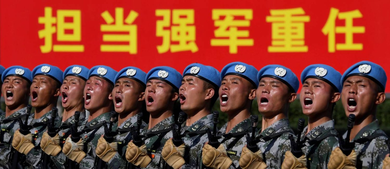 Militares chineses ensaiam para o desfile que na terça-feira, 1º de outubro, celebrará os 70 anos da proclamação da República Popular da China Foto: Naohiko Hatta / REUTERS