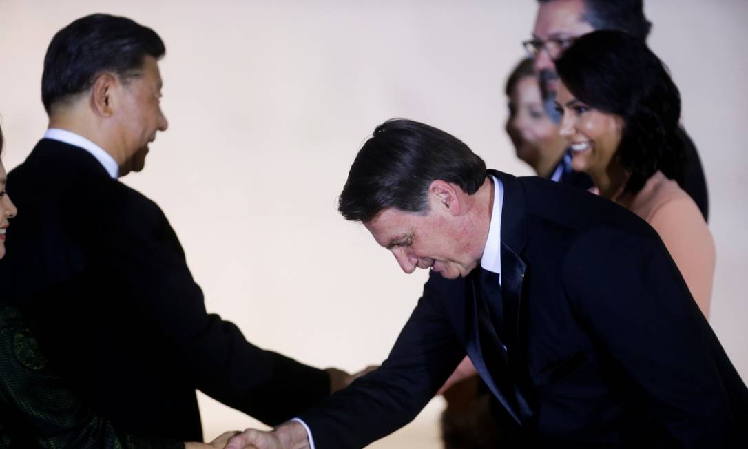 O presidente Jair Bolsonaro e sua mulher, Michelle Bolsonaro, saúdam o presidente chinês Xi Jinping e sua mulher, Peng Liyuan, no Palácio Itamaraty Foto: ADRIANO MACHADO / REUTERS 13-11-19