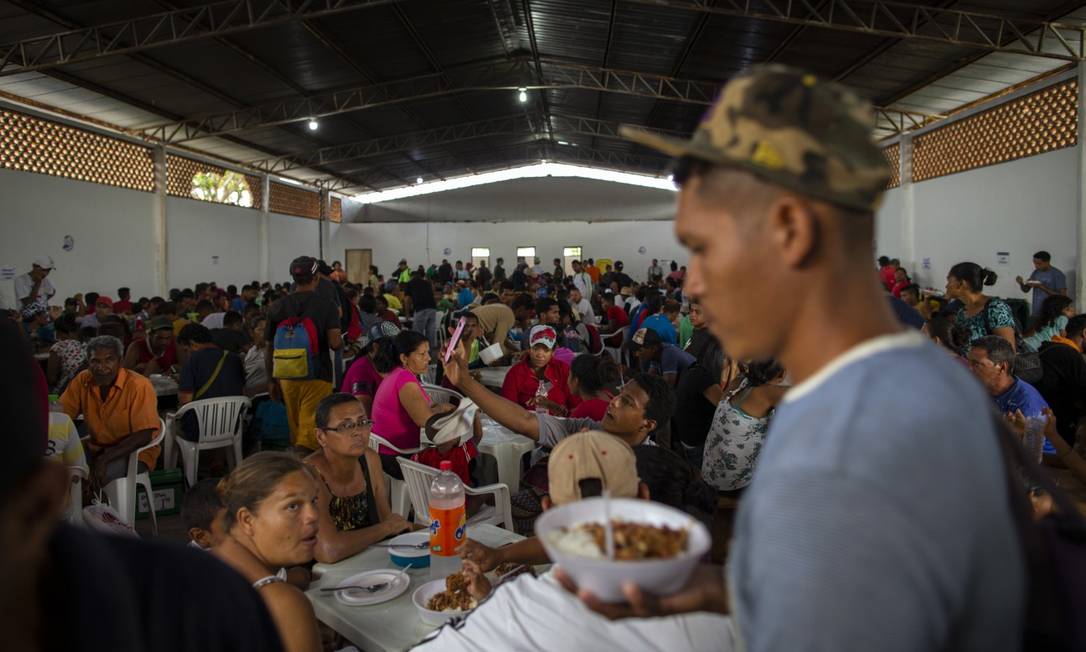 Local para distribuição de comida aos venezuelanos em Roraima Foto: Daniel Marenco / Agência O Globo 26-7-19