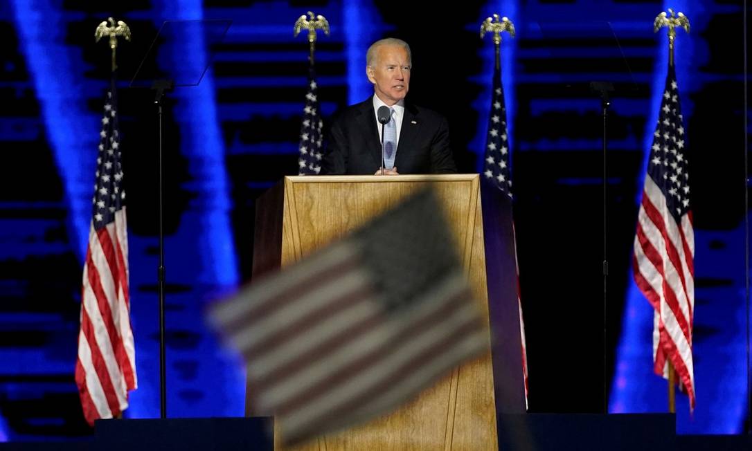 O presidente eleito dos Estados Unidos, Joe Biden, em seu primeiro discurso após o anúncio do resultado Foto: POOL / REUTERS