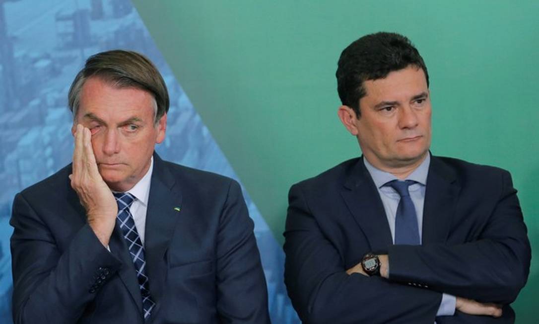 Bolsonaro e Moro, rompidos há duas semanas, mas com desavenças desde o começo do governo Foto: Adriano Machado / Reuters